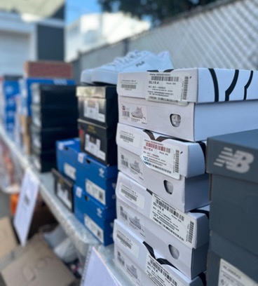 Shoes for distribution at the Soles4Souls x Elliot Tebele Shoe Event in Richmond, NY